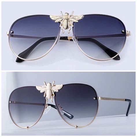 gucci sunglasses with bee in the middle|Gucci glasses with bumble bee.